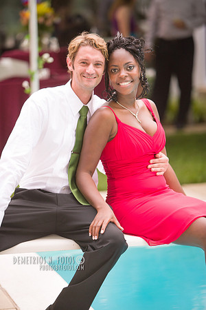 Bride and groom by a pool