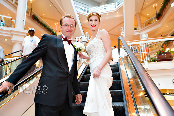 Bride and groom on escalator